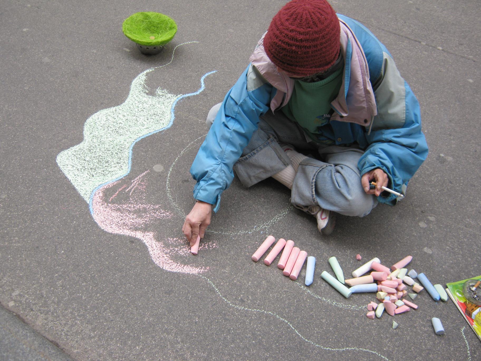 Die Kreidemalerin, ein Kennzeichen der Getreidegasse